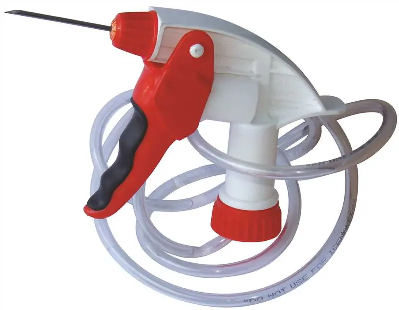 Syringe-Type Injector With Integrated Drop-In Hose Fitting 1